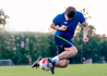 Man playing soccer.