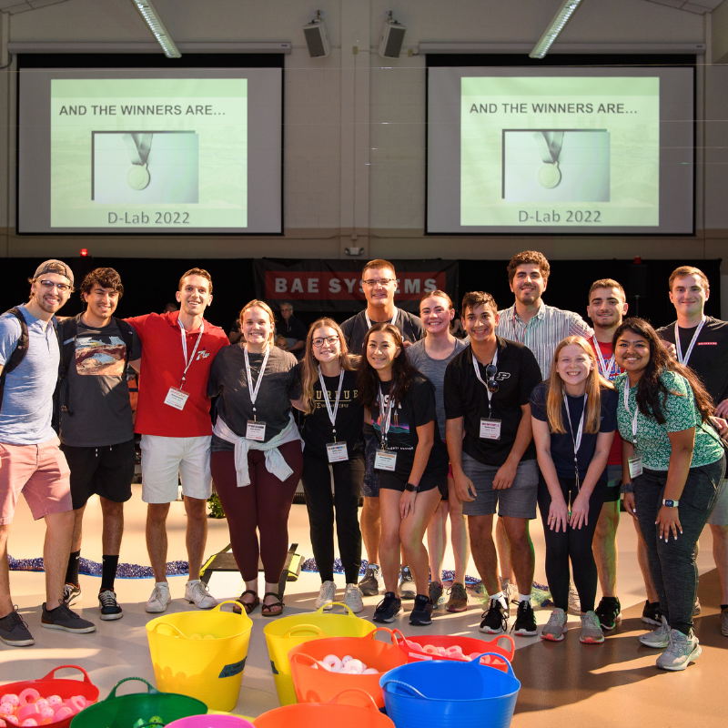 The winning developmental lab team posing for a group photo after their victory. 