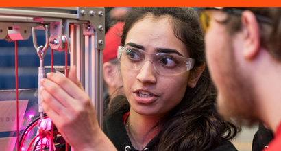 A student participating in a FIRST event, a BAE Systems sponsored STEM competition.