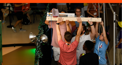 BAE Systems leadership development participants compete in an engineering competition at the 2022 leadership development conference in New Hampshire.