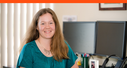 Erin, a BAE Systems employee, works from her home office.