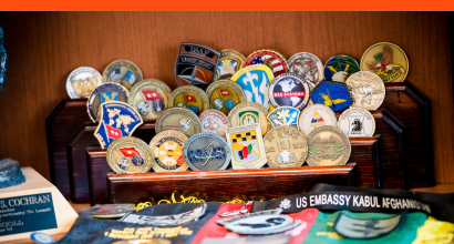 Military medals on a desk.