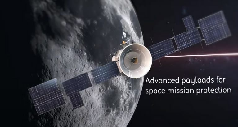 An animated image of a satellite floating in space. Text on screen: Advanced payloads for space mission protection. Click to watch the video.