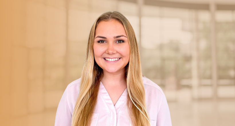 Ellen, a virtual reality intern, smiles for a headshot.