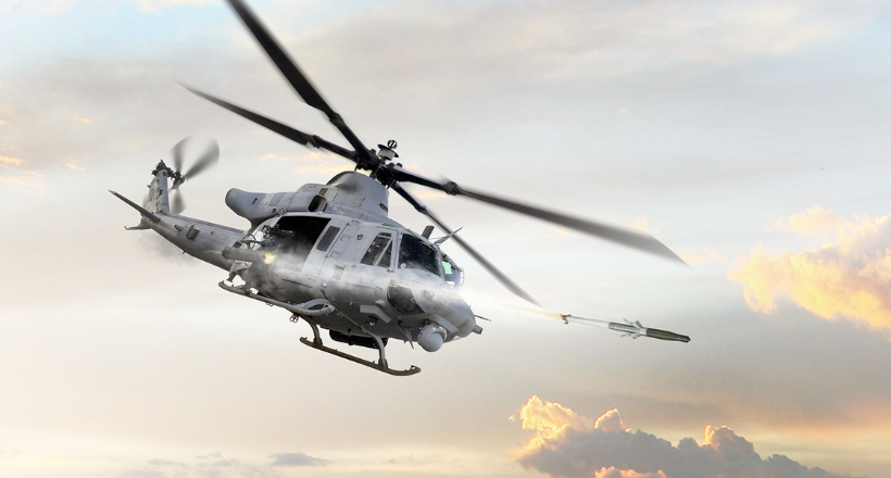 A military helicopter and the APKWS.