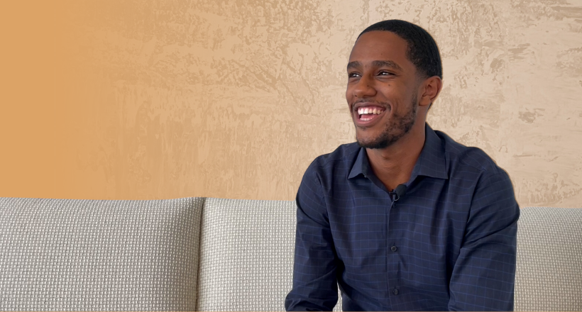 Phin, an information technology intern, smiles during an interview about his experience about of the LEAP internship program.