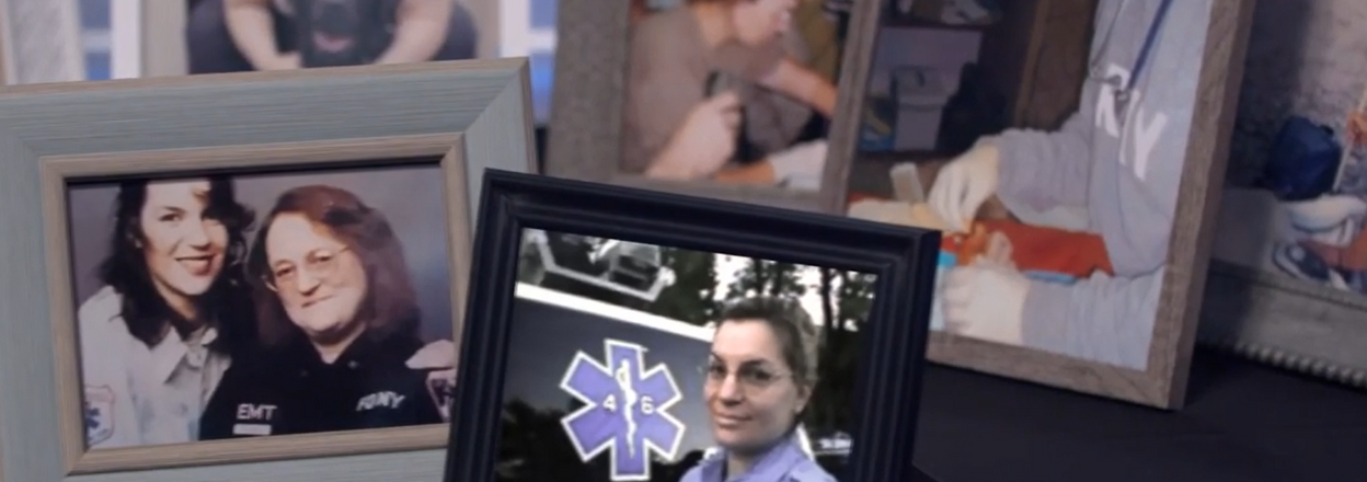 Framed photos sitting on a desk.