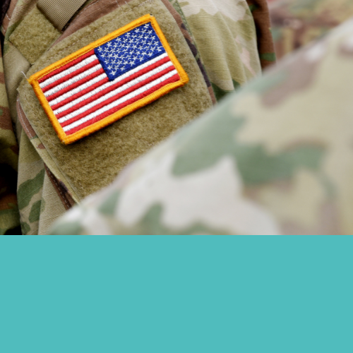 An American flag patch on the shoulder of a service member.