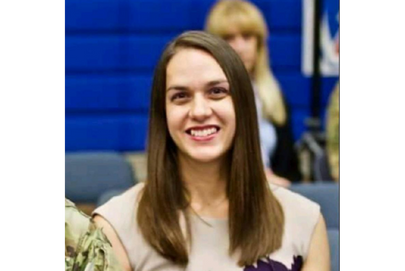 Registered Nurse smiling towards camera