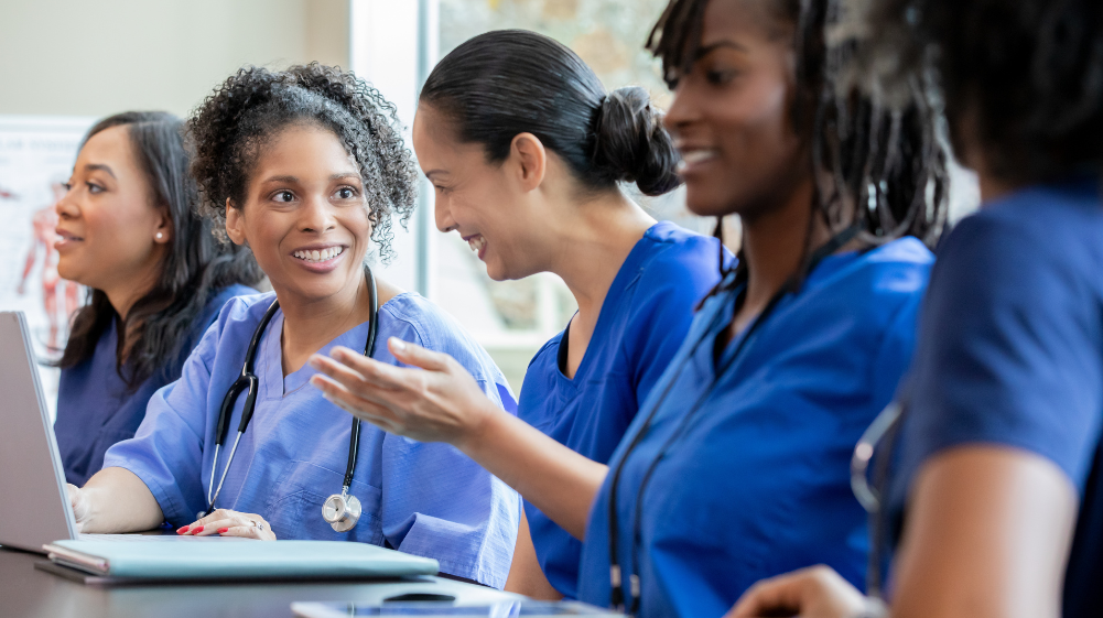 healthcare team members participating in collaborative discussion
