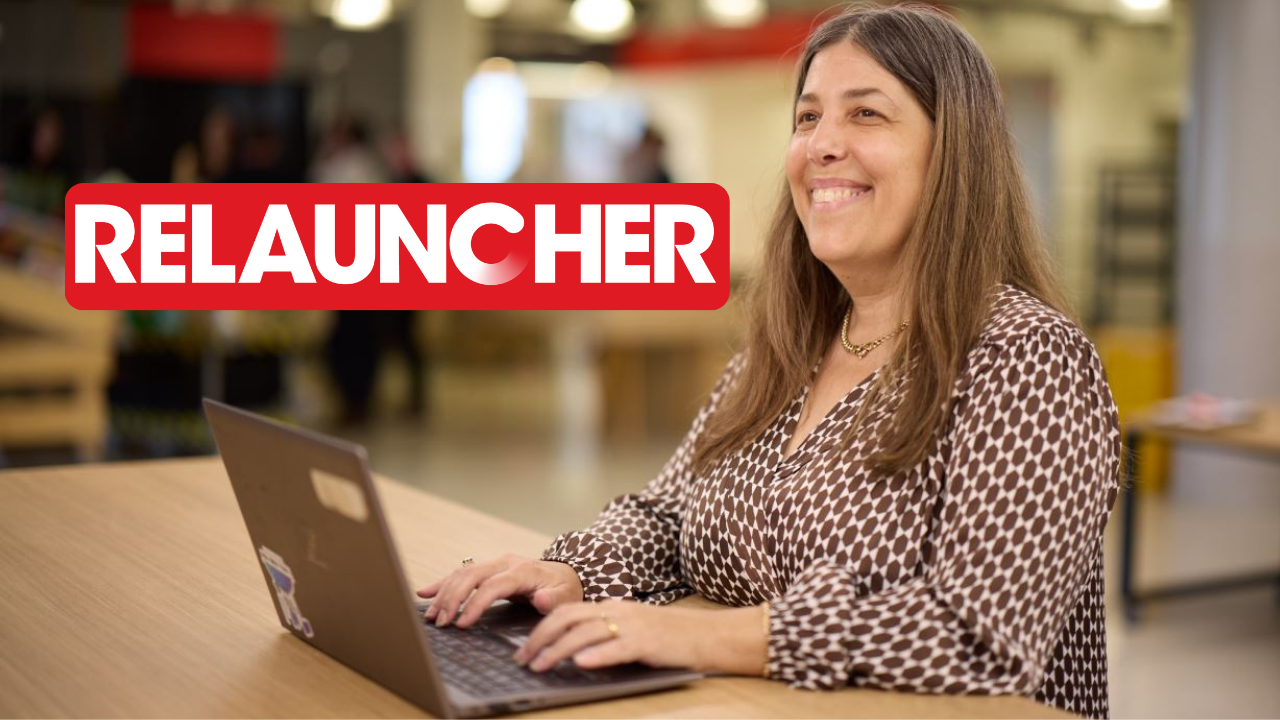 Female team member working on the laptop