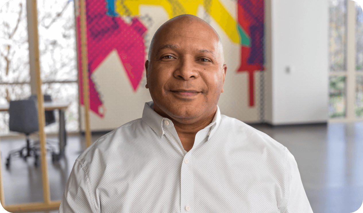 Lowe's corporate associate sitting in an open workspace at Corporate Headquarters
