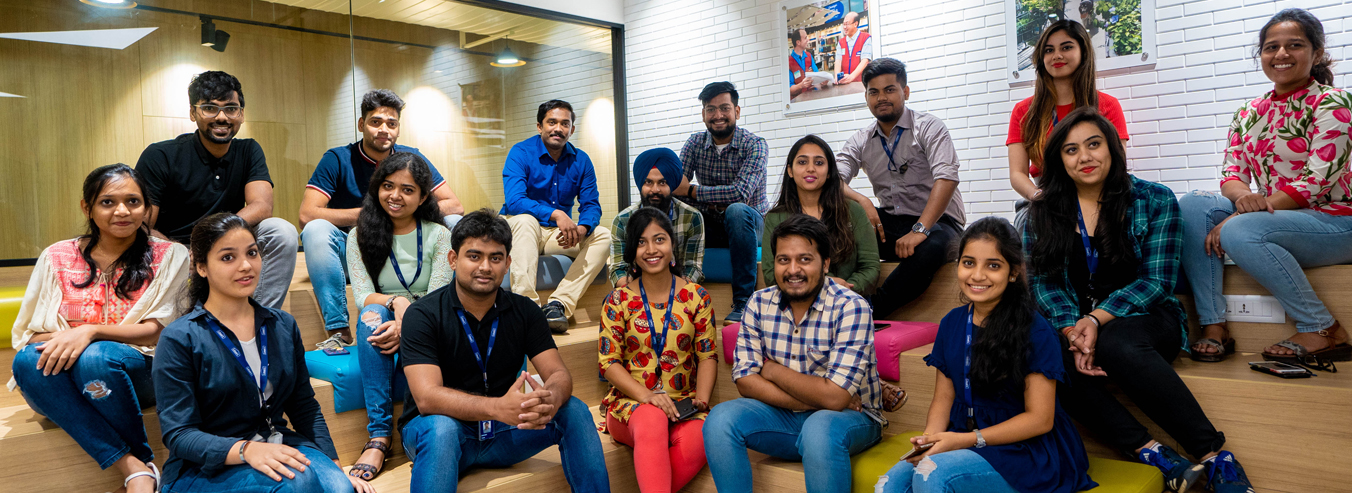 Two associates having a conversation at work