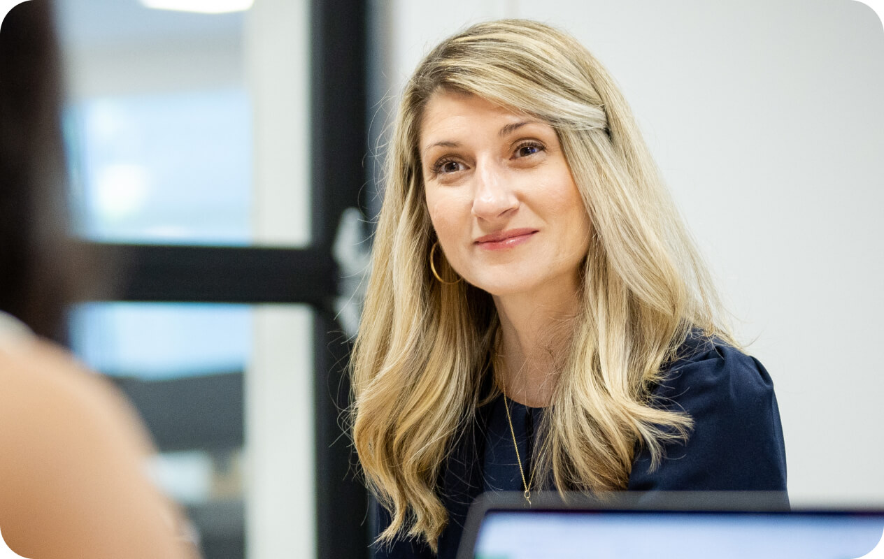 Corporate associate having a meeting with her coworkers