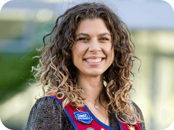 Corporate associate standing outside of corporate headquarters