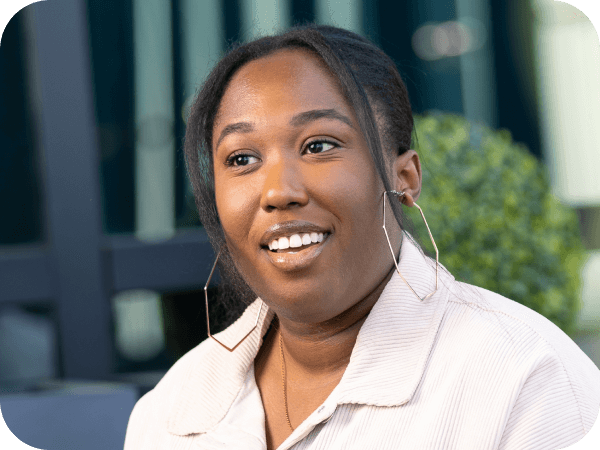 Associate having a meeting outdoors at corporate headquarters