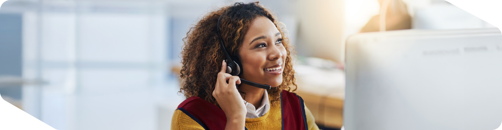 Central Selling associate on her headset assisting a customer