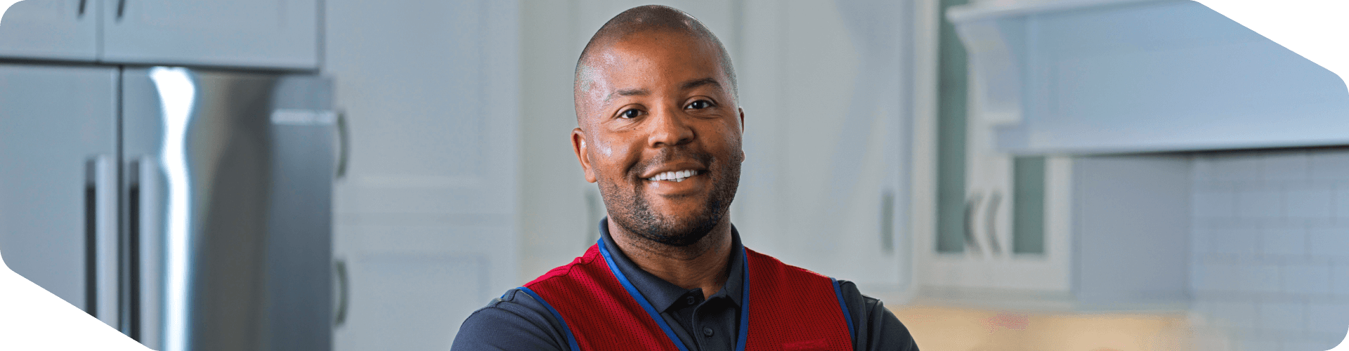 Lowe's associate standing in a customer's home