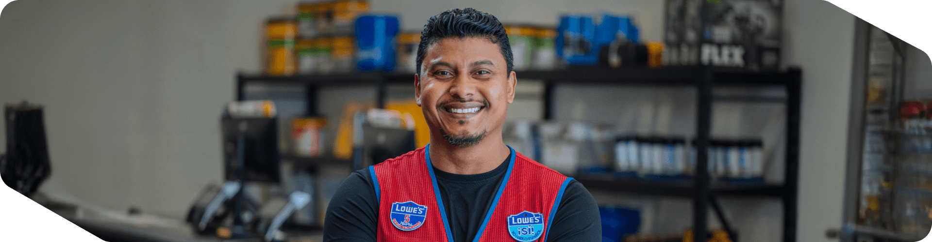 Confident Lowe's associate standing in the Pro department