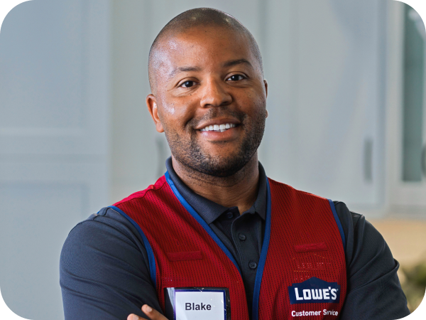 Lowe's associate standing in a customer's home