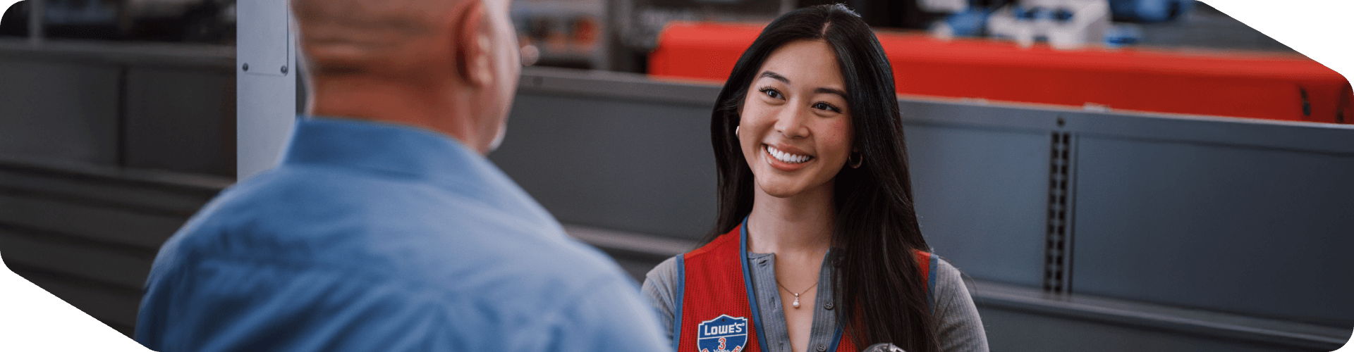 Lowe's cashier checking out a customer