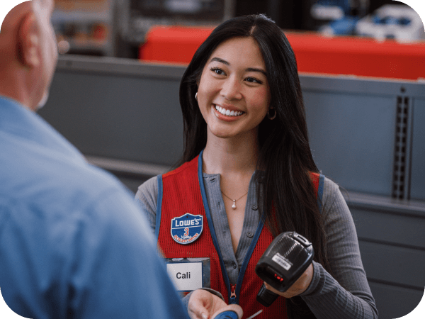 Lowe's cashier checking out a customer