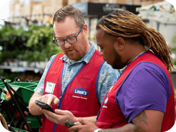 Lowe's Store Manager assisting an associate