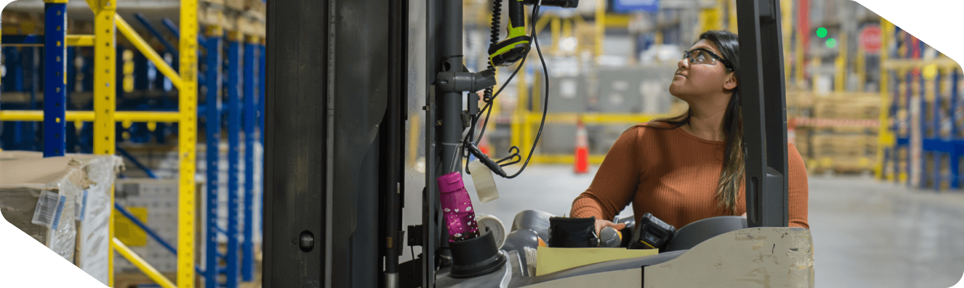 Supply Chain team member operating a forklift