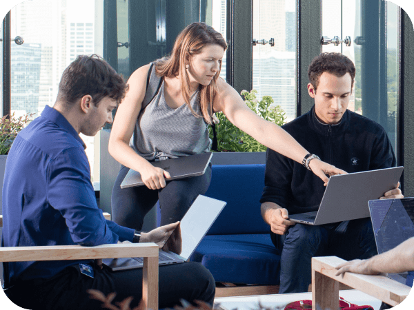 Associates working together outside at the Tech Hub