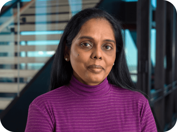 Lowe's Tech associate standing by the steps at the Tech Hub