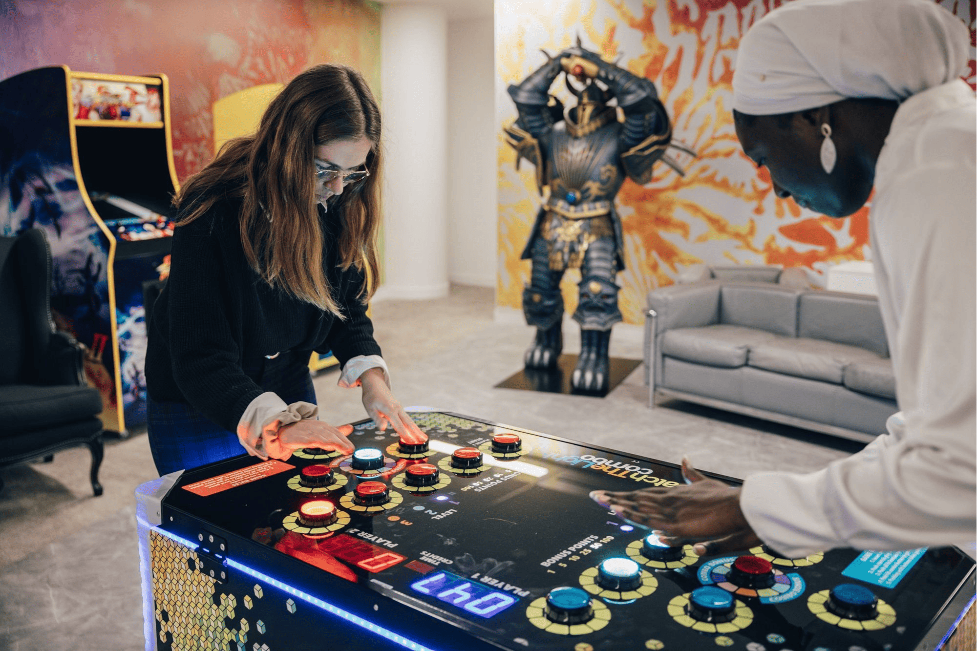 A glimpse inside our modern break room featuring arcade games and interactive play areas designed to foster creativity and team bonding.