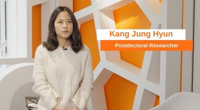 A professional portrait of Hyun Jung, a Coreference Resolution Postdoctoral researcher, smiling in a modern office environment with a clean, academic background.