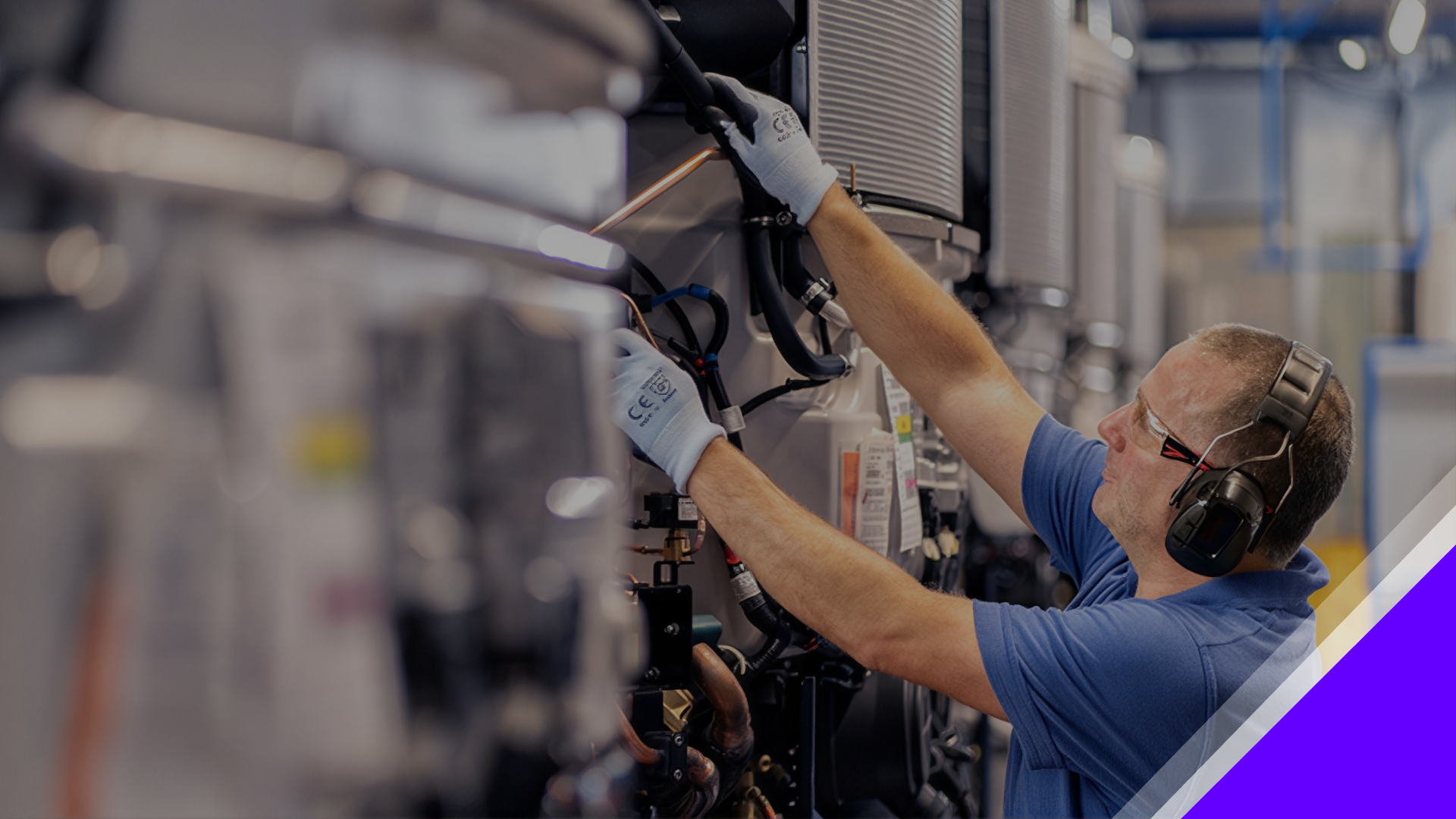 Employee working on Trane machinery