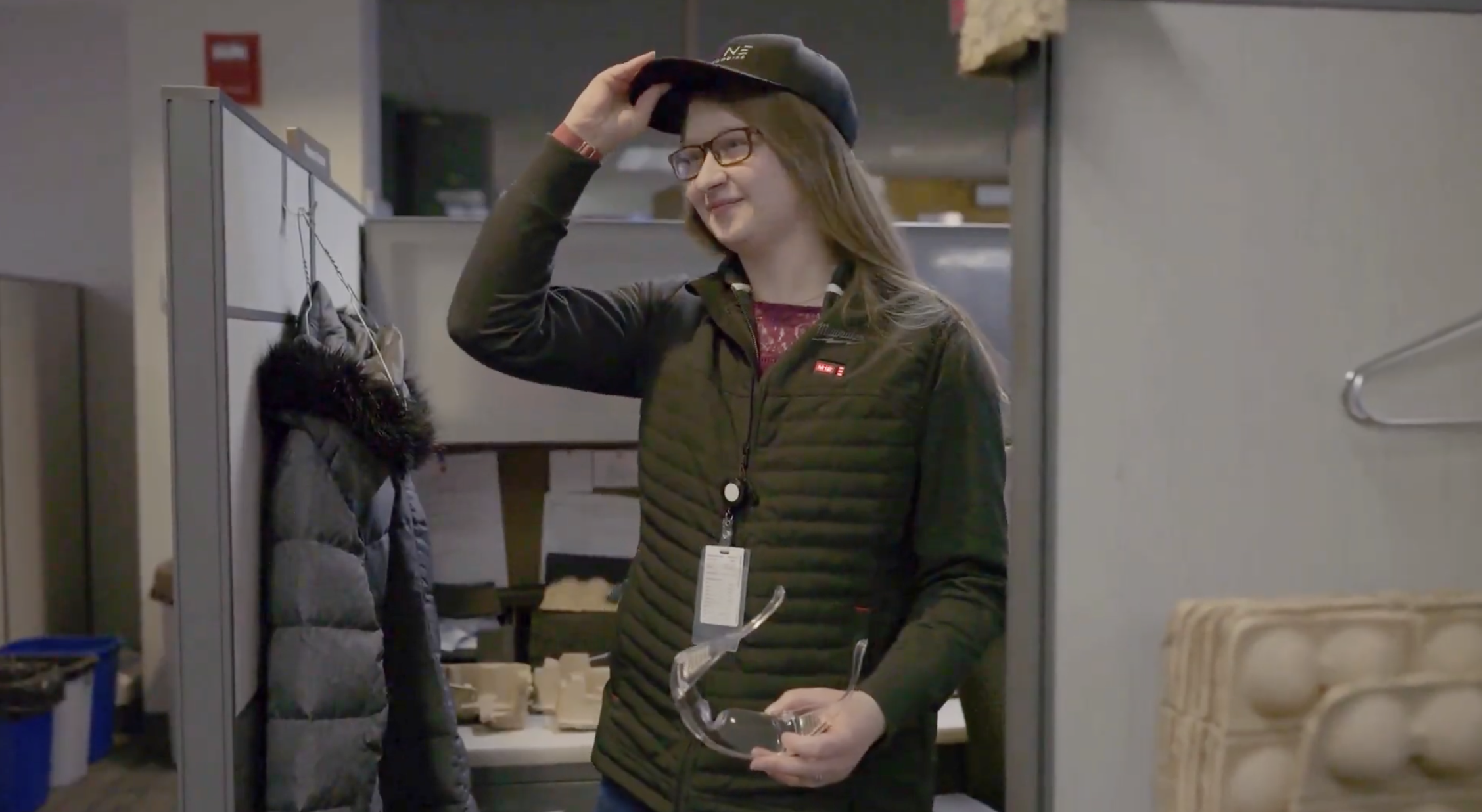 Rebecca adjusting her Trane hat